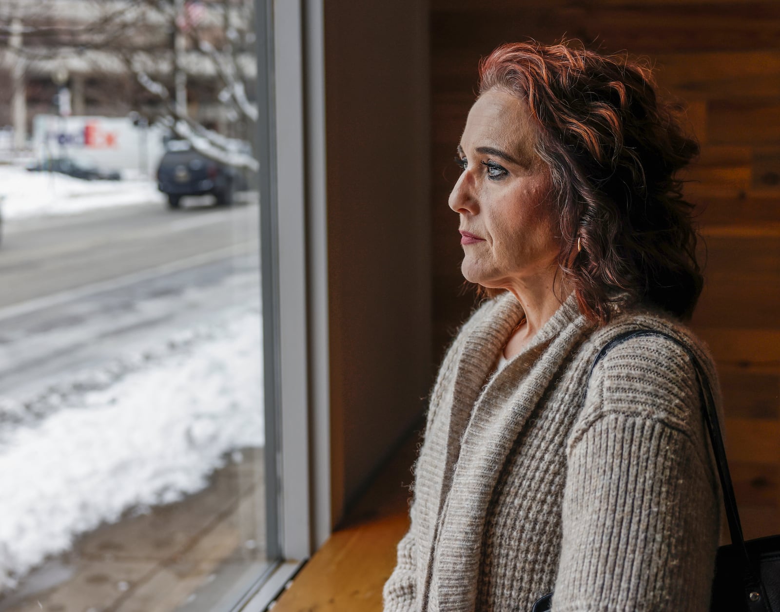 Christine Shediack poses for a portrait on Wednesday, Dec. 3, 2025, at COhatch Springfield. Her son is a student at the School of Innovation (SOI), which is closing in 2026. She credits SOI with accommodating and supporting him through his autism. JOSEPH COOKE/STAFF