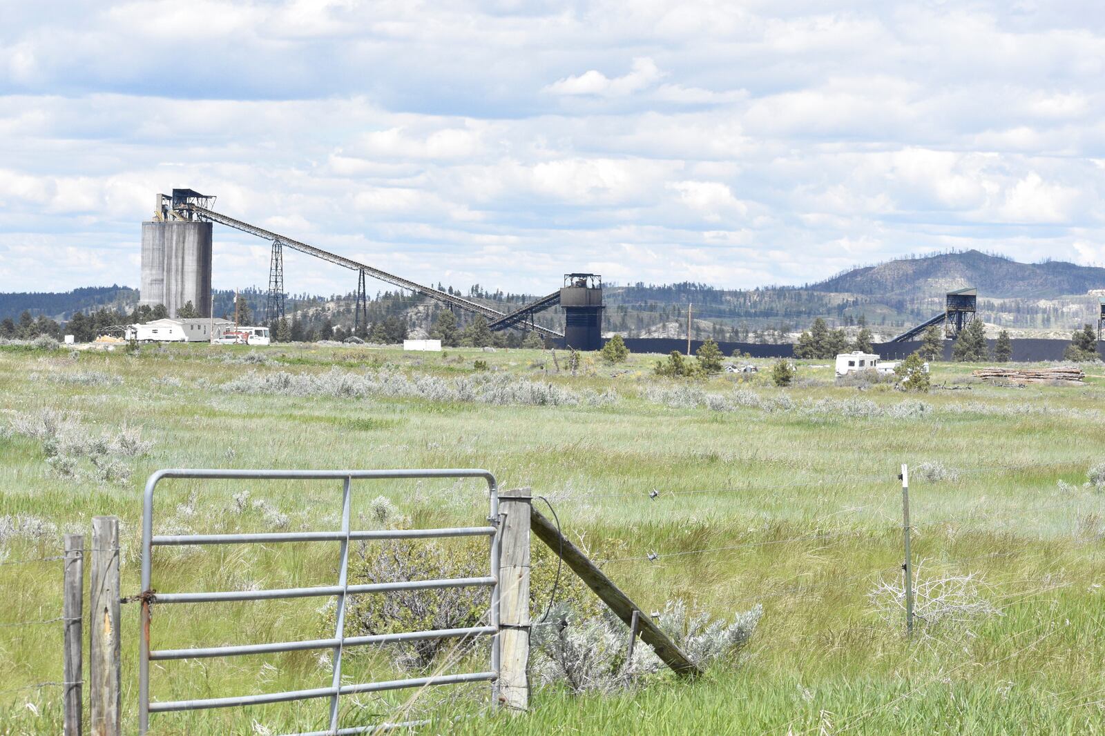 Signal Peak Energy's Bull Mountains Mine is seen across a field, on May 21, 2025, near Roundup, Montana. (AP Photo/Matthew Brown)