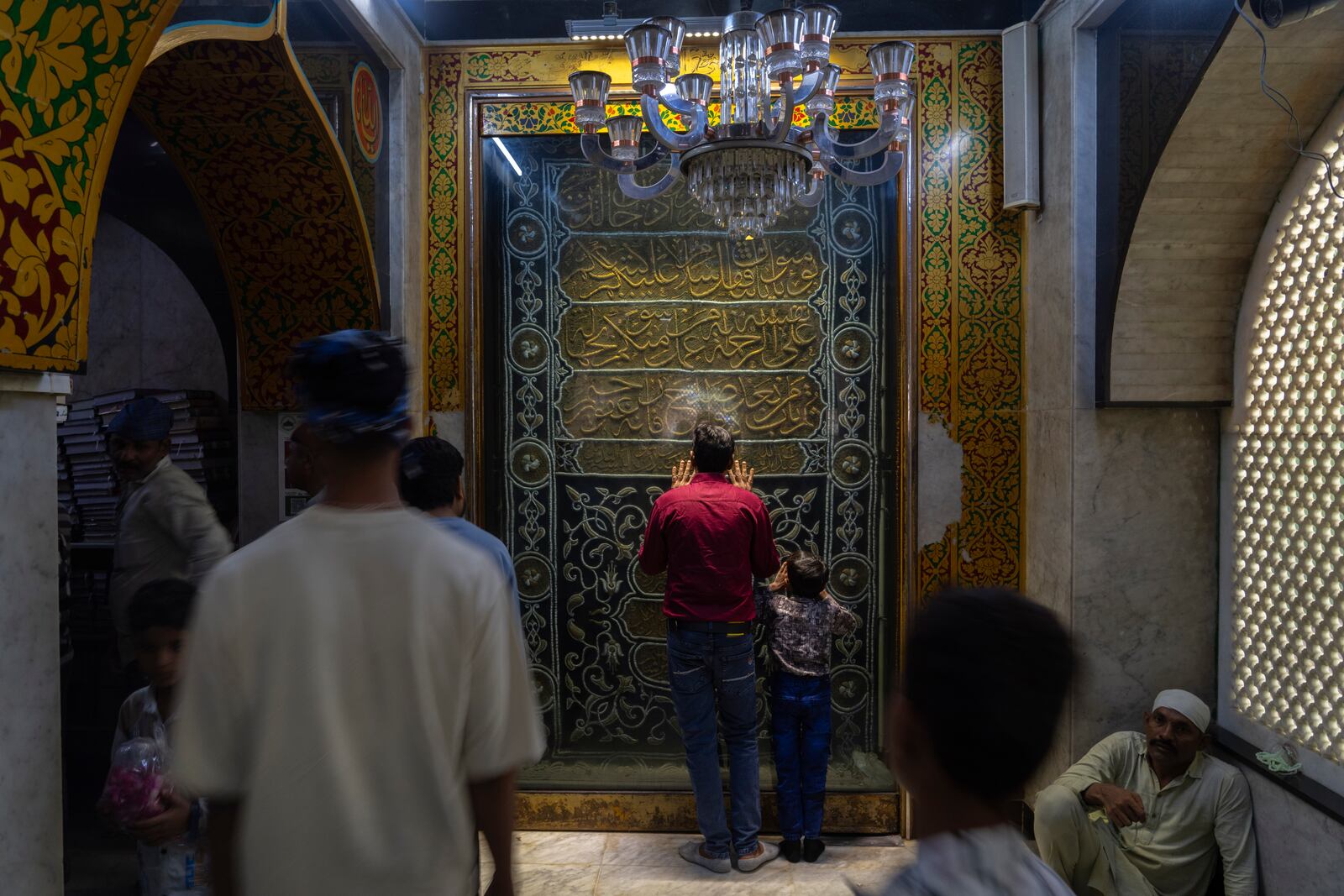 A Muslim man offers prayers at Mahim Dargah, a Muslim shrine in Mumbai, India, Wednesday, April 2, 2025. (AP Photo/Rafiq Maqbool)