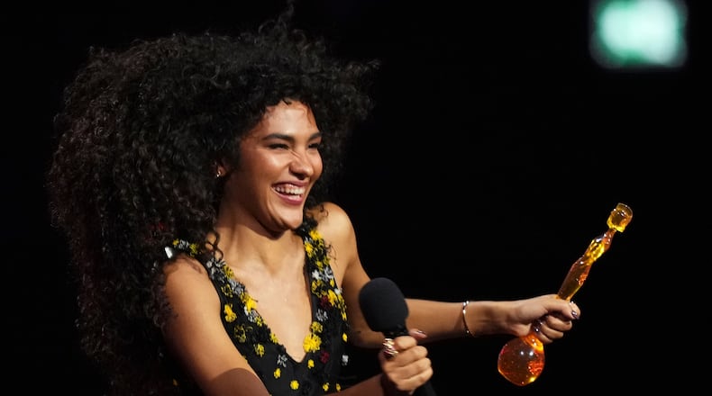 Olivia Dean wins the Pop Act award during the Brit Awards 2026 in Manchester, England, Saturday, Feb. 28, 2026. (Photo by Scott A Garfitt/Invision/AP)