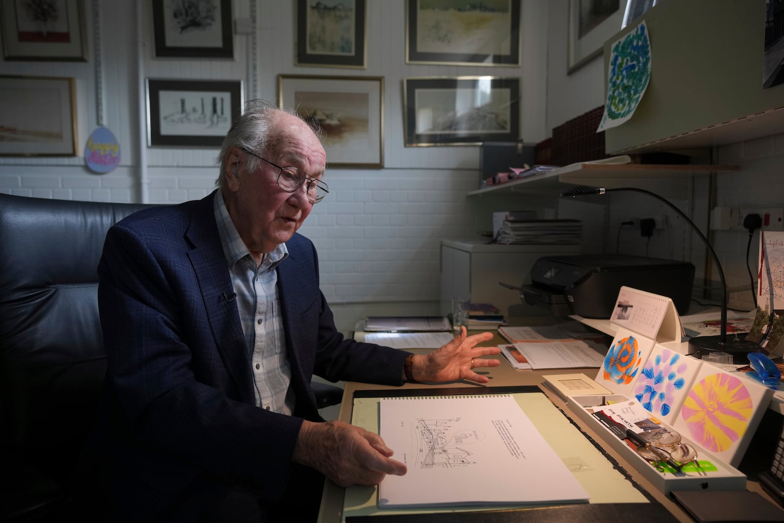 John Goldsmith, 94, speaks during an interview at his home in London, Thursday, April 24, 2025. (AP Photo/Kin Cheung)