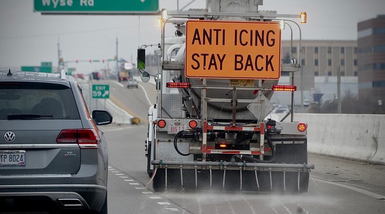 Ohio Department of Transportation crews prep Interstate 75 North near Interstate 70 on Thursday, Nov. 17, 2022, for upcoming bad weather. MARSHALL GORBY \STAFF