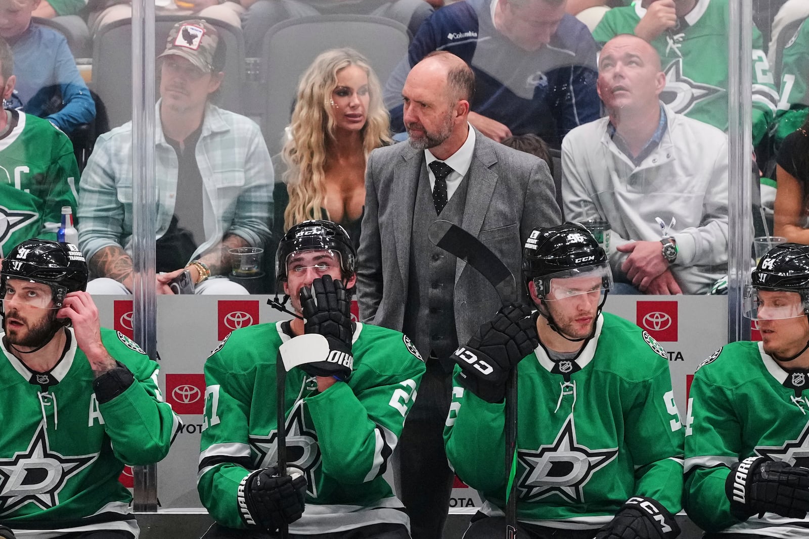 Dallas Stars head coach Pete DeBoer and the bench watch play against the Colorado Avalanche in the third period in Game 7 of a first-round NHL hockey playoff series Saturday, May 3, 2025, in Dallas. (AP Photo/Julio Cortez)