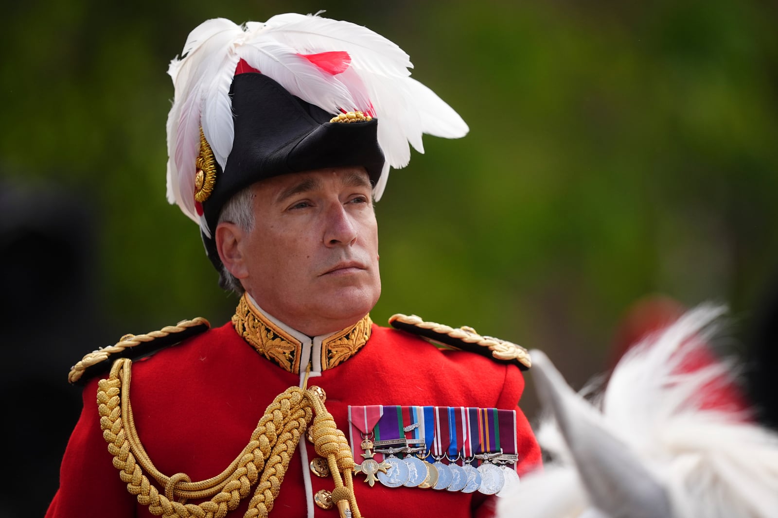 Major General James Bowder, head of the Household Division waits to lead a military procession, during the VE Day 80th anniversary parade, in London, Monday, May 5, 2025. (James Manning/Pool Photo via AP)