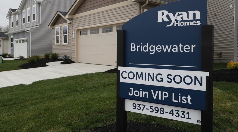 Model homes in the Bridgewater development on Tuttle Road. BILL LACKEY/STAFF