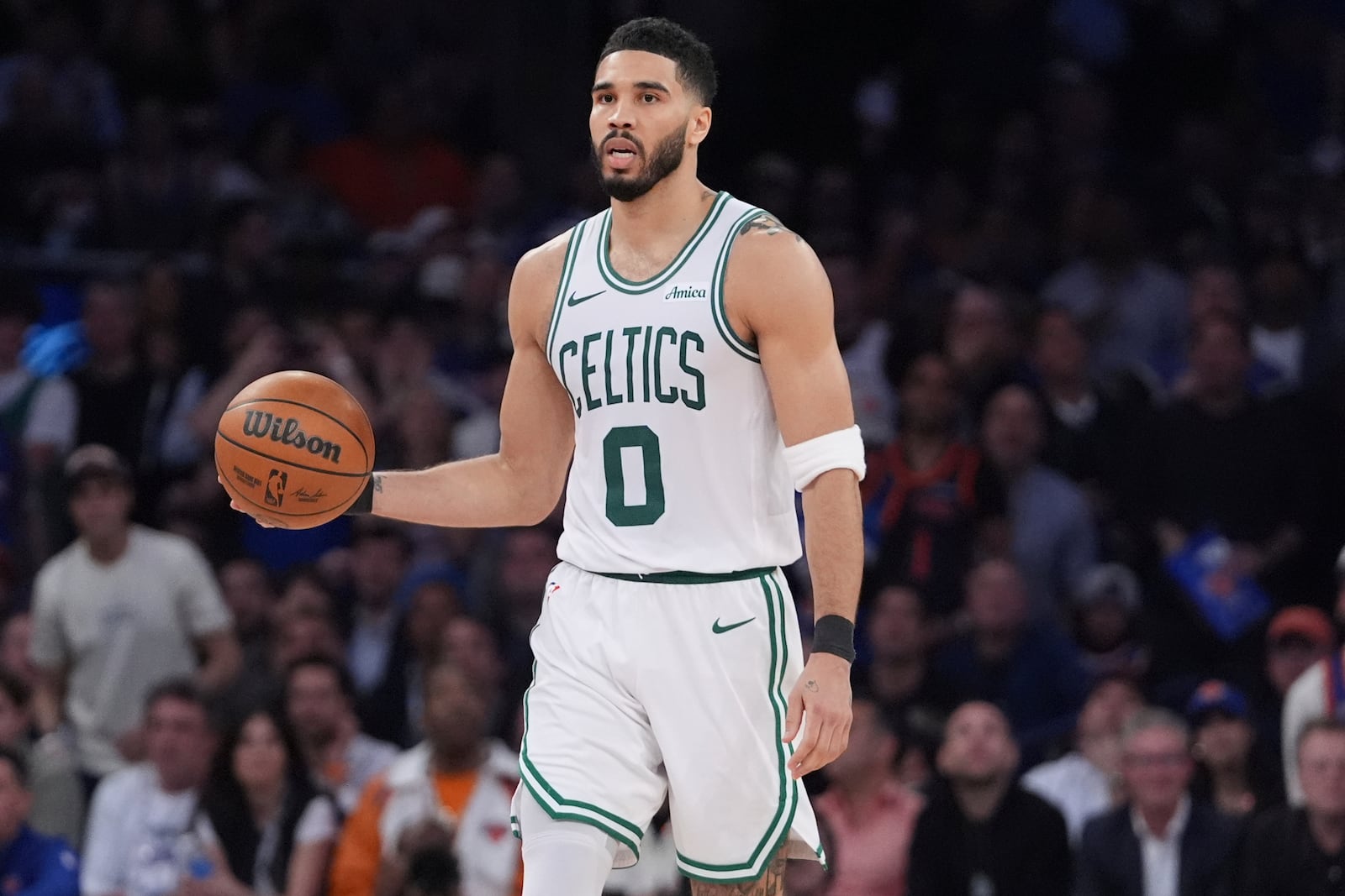 Boston Celtics' Jayson Tatum (0) looks to pass during the second half of Game 4 in the Eastern Conference semifinals of the NBA basketball playoffs against the New York Knicks Monday, May 12, 2025, in New York. (AP Photo/Frank Franklin II)