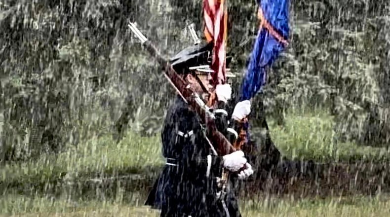 A downpour did not stop last year's Enon Parade. CONTRIBUTED