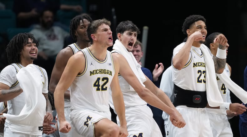 Michigan celebrates as they defeat Gonzaga in an NCAA college basketball game in the Players Era tournament in Las Vegas, Wednesday, Nov. 26, 2025. (AP Photo/Eric Gay)