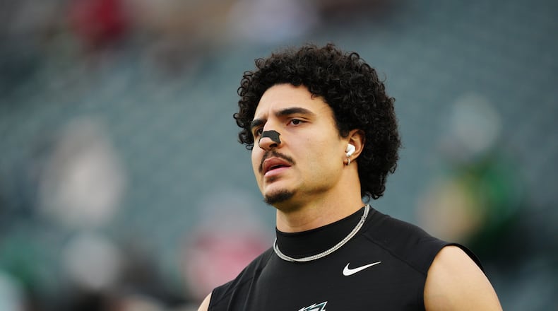 FILE - Philadelphia Eagles linebacker Jaelan Phillips warms up before an NFL wild-card playoff football game against the San Francisco 49ers on Jan. 11, 2026, in Philadelphia. (AP Photo/Derik Hamilton, file)