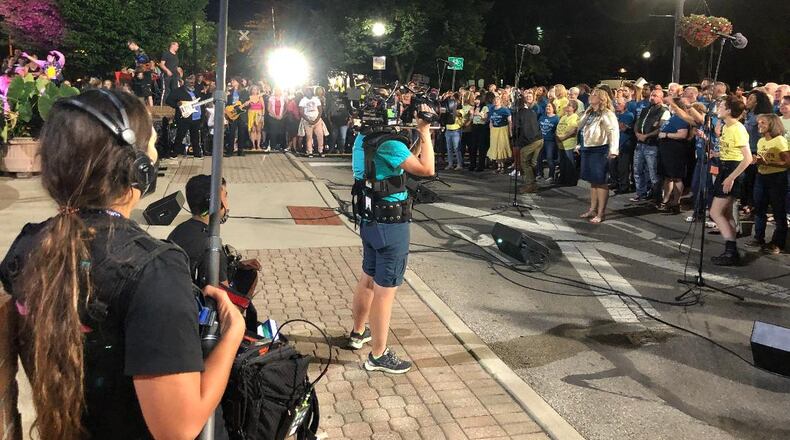 A professional crew films the featured performers and chorus performing Saturday night in Springfield for what will be the finale of a pilot film for ABC Disney.