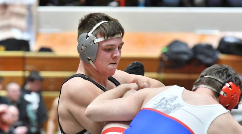 Evan Lykins of Graham wrestles in the Division II state dual finals on Sunday at St. John Arena. Graham lost to Louisville in the title match. Greg Billing/CONTRIBUTED
