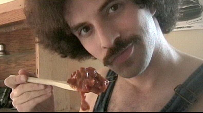 One of the many faces of Joel Moss Levinson. He's an online contest winner and has business card to prove it.