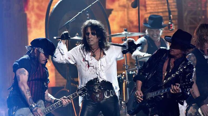 LOS ANGELES, CA - FEBRUARY 15: (L-R) Actor/musician Johnny Depp, singer Alice Cooper and musician Joe Perry of Hollywood Vampires perform onstage during The 58th GRAMMY Awards at Staples Center on February 15, 2016 in Los Angeles, California. (Photo by Kevork Djansezian/Getty Images for NARAS)