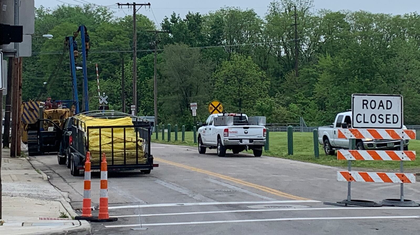 Water Street was closed at the railroad tracks near Buck Creek on Wednesday, May 14, 2025 after a partial train derailment the day before. BROOKE SPURLOCK / STAFF