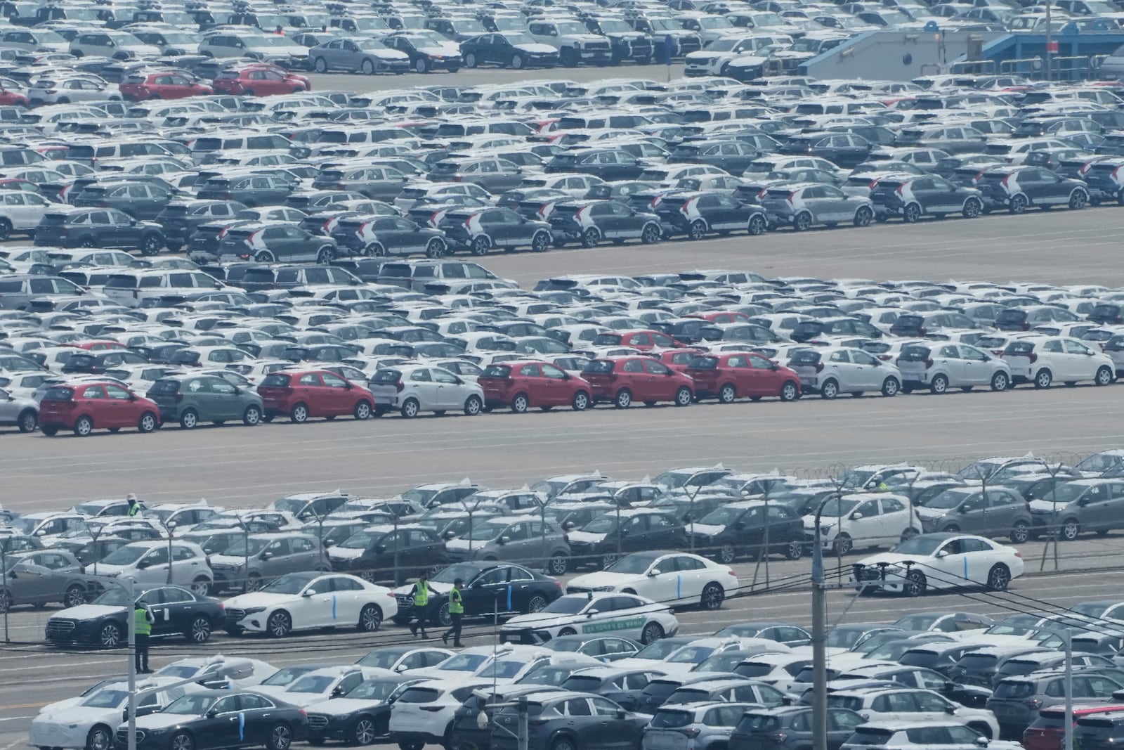 Vehicles for export are parked at a port in Pyeongtaek, South Korea, Tuesday, July 8, 2025. (AP Photo/Ahn Young-joon)