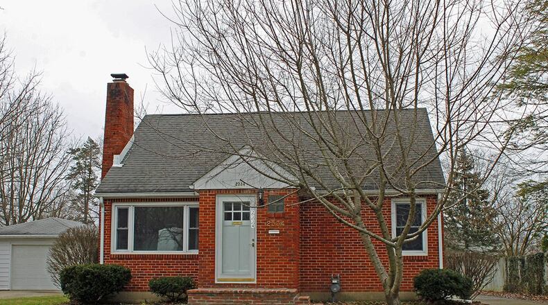 Built in 1948, this brick ranch offers a bonus space and an enclosed porch. The 3-bedroom home has about 1,180 sq. ft. of living space and an attached, 2-car garage. CONTRIBUTED PHOTO BY VICKIE KAPNAS