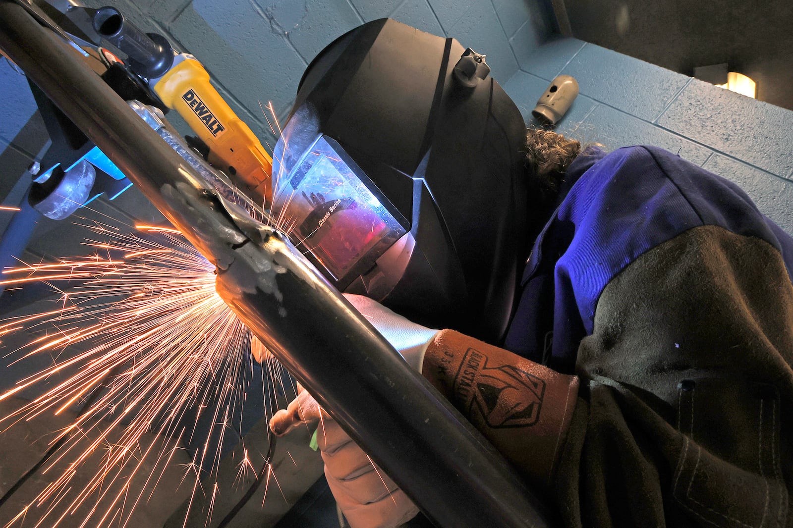 Nickolas Shriver practices his welding in the Springfield School District's School of Innovation's welding program Thursday, April 13, 2023. BILL LACKEY/STAFF