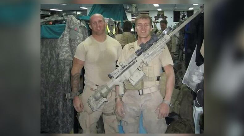 Jerod Lucas, left, with Kyle Edwards while on deployment. CONTRIBUTED