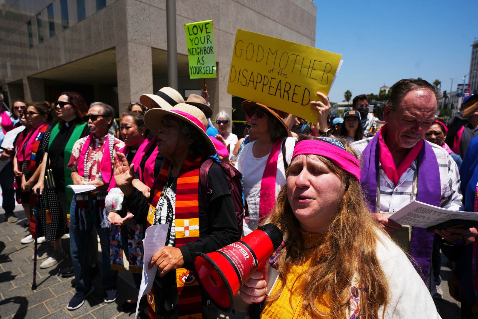 Protesters gather to denounce ICE, U.S Immigration and Customs Enforcement, operations Tuesday, June 10, 2025, in Los Angeles. (AP Photo Damian Dovarganes)