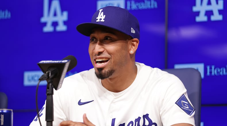 Edwin Díaz speaks during his introduction as a new member of the Los Angeles Dodgers baseball team Friday, Dec. 12, 2025, in Los Angeles. (AP Photo/Ethan Swope)