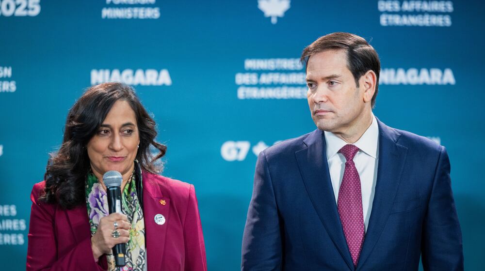 U.S. Secretary of State Marco Rubio, right, stands beside Canada's Minister of Foreign Affairs Anita Anand, as she speaks ahead of the family photo during the G7 Foreign Ministers' Meeting in Niagara-on-the-Lake, Ontario, on Tuesday, Nov. 11, 2025. (Nick Iwanyshyn/The Canadian Press via AP)