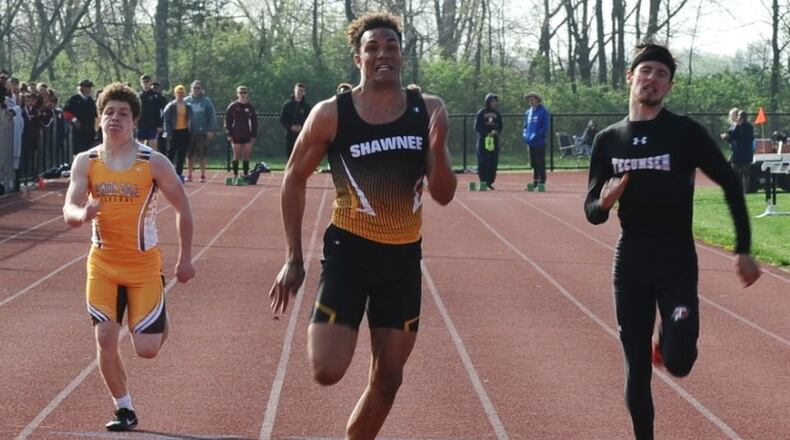 Shawnee’s Robie Glass (center) in the 100-meter dash during Tuesday’s Clark County championships. Greg Billing/CONTRIBUTED