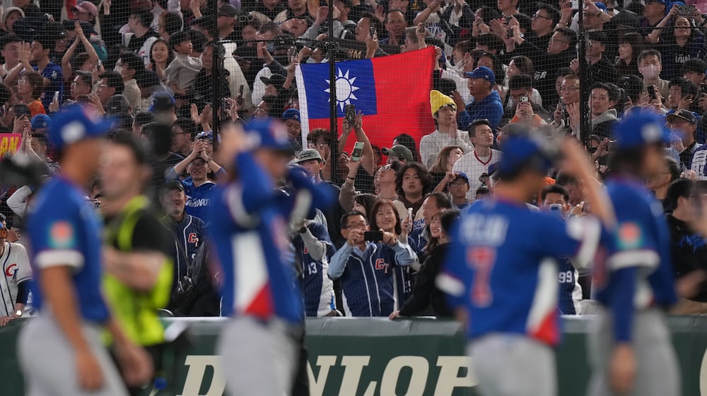 Taiwan players celebrate after defeating South Korea during a World Baseball Classic game between South Korea and Taiwan on Sunday, March 8, 2026 in Tokyo, Japan. (AP Photo/Eugene Hoshiko)