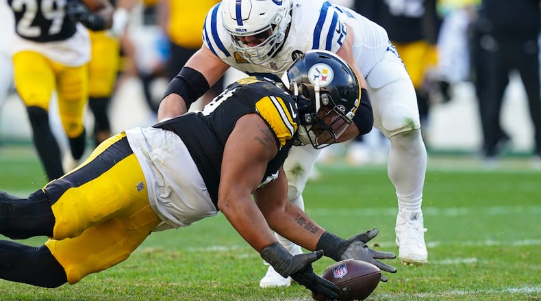 Pittsburgh Steelers defensive tackle Derrick Harmon (99) recovers a fumble in front of Indianapolis Colts guard Quenton Nelson (56) during the second half of an NFL football game in Pittsburgh, Sunday, Nov. 2, 2025. (AP Photo/Matt Freed)