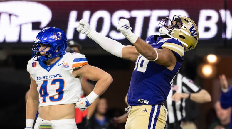 Washington tight end Quentin Moore (88) celebrates his touchdown during the second half of the LA Bowl NCAA college football game against Boise State Saturday, Dec. 13, 2025, in Inglewood, Calif. (AP Photo/Kyusung Gong)