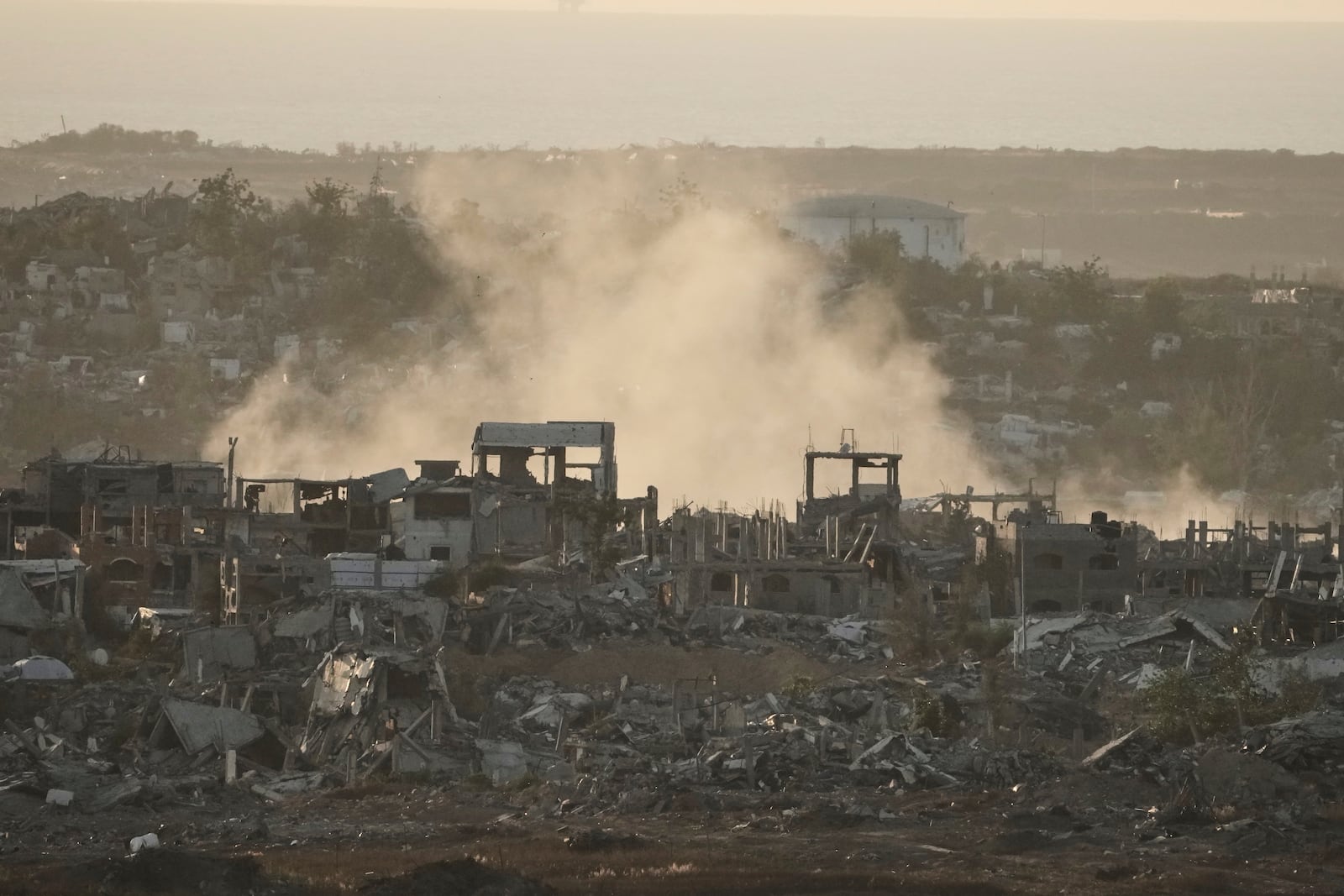 Smoke rises following an Israeli army bombardment in Gaza Strip, seen from southern Israel, Tuesday, May 20, 2025. (AP Photo/Maya Alleruzzo)