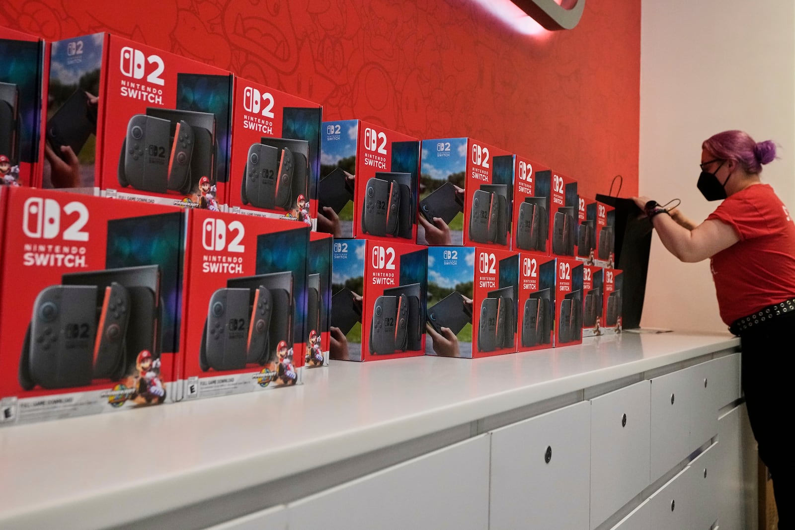 Nintendo Switch 2 devices are ready for sale at the Nintendo store in New York's Rockefeller Center, Thursday, June 5, 2025. (AP Photo/Richard Drew)