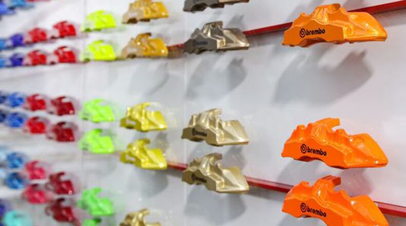 Brembo’s display at the New York Auto Show in March 2018 showcased its many colored brake calipers. (Brembo/TNS)