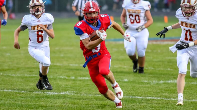 Northwestern High School junior Ben VanNoord runs for a 29-yard touchdown in the first quarter against Northeastern on Friday night at Taylor Field. CONTRIBUTED PHOTO BY MICHAEL COOPER