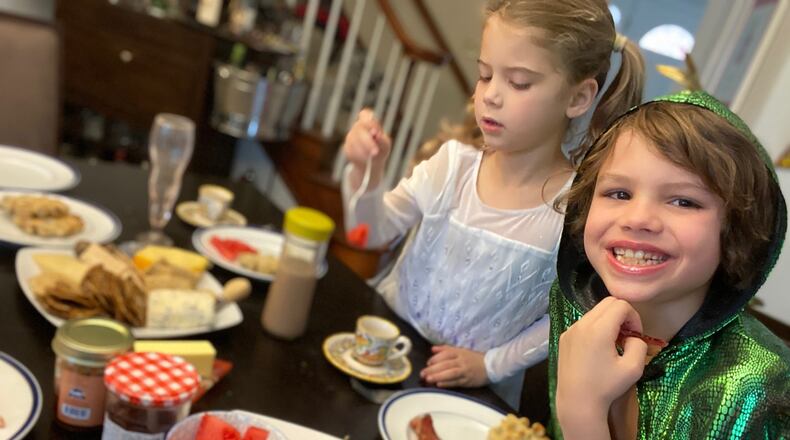 Miro (left) and Miles Deal enjoying a “royal” breakfast the entire family made together. CONTRIBUTED