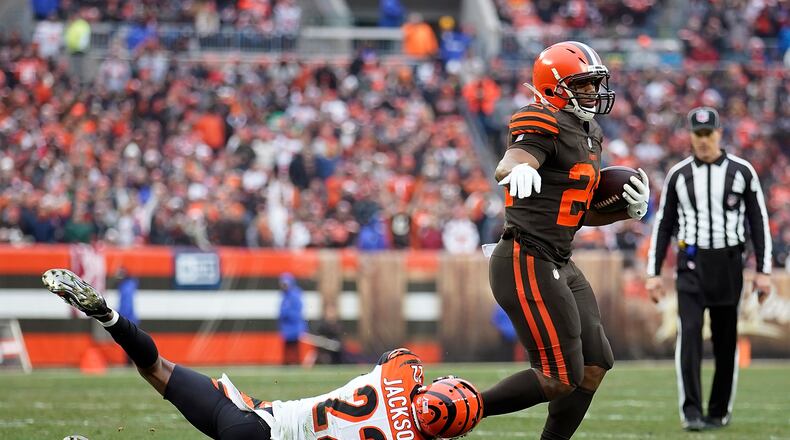 Nick Chubb of the Cleveland Browns avoids a tackle by William Jackson of the Cincinnati Bengals during the second quarter at FirstEnergy Stadium on December 23, 2018 in Cleveland, Ohio. (Photo by Kirk Irwin/Getty Images)