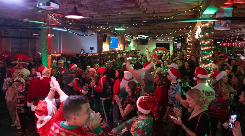 Mother Stewart's Brewing Company will be transformed into SantaCon on Saturday, Dec. 13 with costume contests, live music, hot drinks, a Christmas tree village and more. CONTRIBUTED