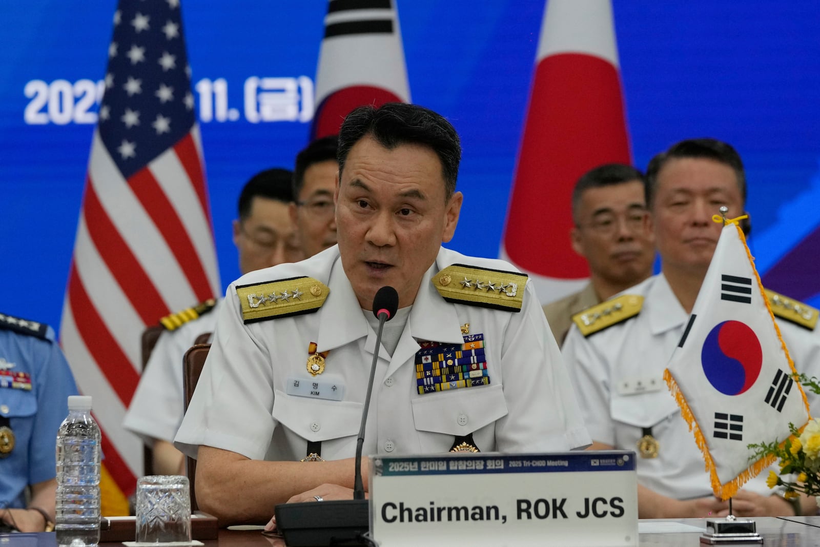 Adm. Kim Myung-soo, chairman of the South Korean Joint Chiefs of Staff, speaks during a Trilateral Chiefs of Defense meeting with Gen, Yoshihide Yoshida, Chief of Staff, Joint Staff of Japan and John Daniel Caine, Chairman of the U.S. Joint Chiefs of Staff (both are not in the picture) at the Defense Ministry in Seoul, South Korea, Friday, July 11, 2025. (AP Photo/Ahn Young-joon, Pool)