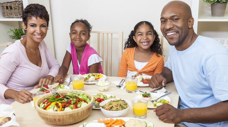Parents can lead by example — because children are watching — when it comes to healthy eating. CONTRIBUTED