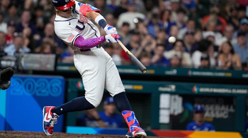 United States right fielder Aaron Judge (99) lines out to center field in the sixth inning of a World Baseball Classic game against Italy , Tuesday, March 10, 2026, in Houston. (AP Photo/Ashley Landis)
