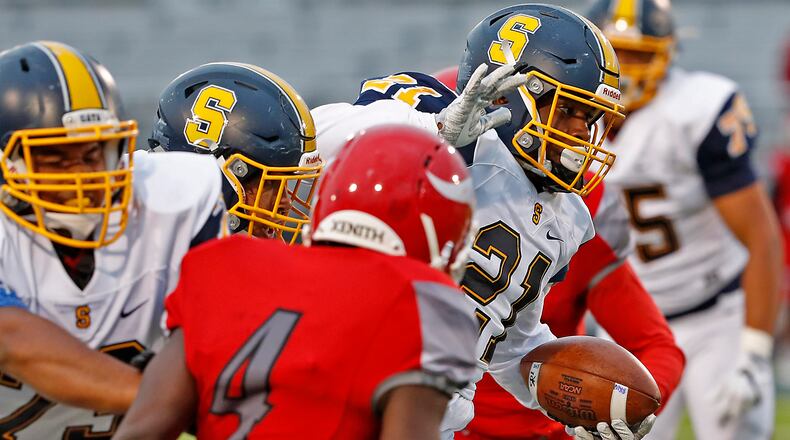 Springfield’s Tavion Smoot carries the ball for a touchdown against Princeton last season. Springfield quarterback Leonard Taylor lateraled the ball to Smoot as he was tackled. Bill Lackey/Staff