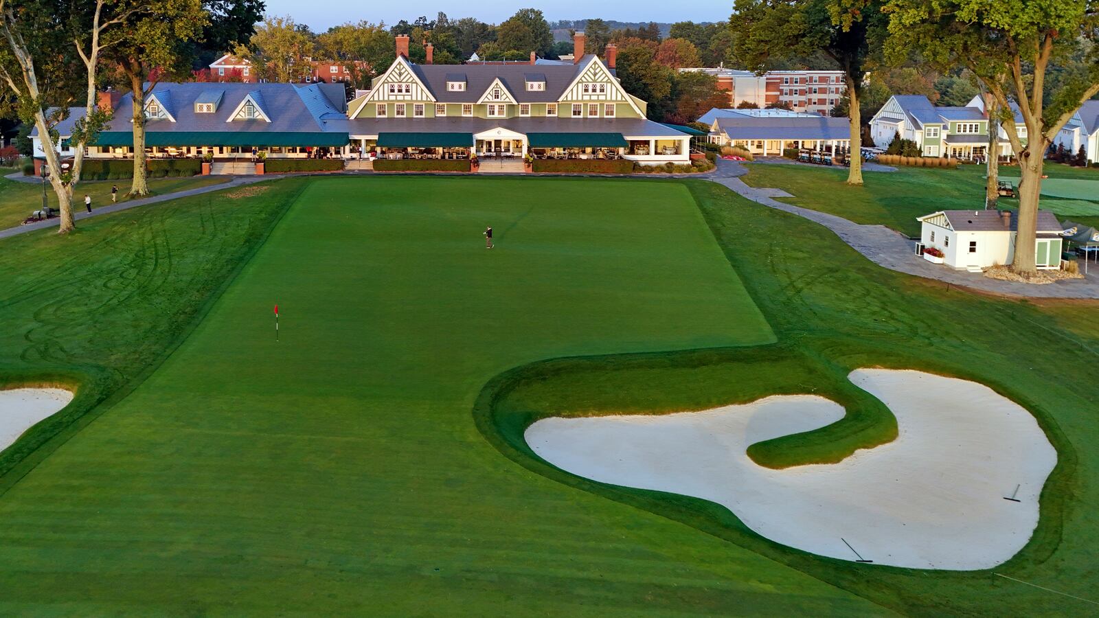 FILE - This is the ninth green in front of the clubhouse at Oakmont Country Club in Oakmont, Pa., Monday, Sept. 16, 2024, the course for the 2025 U.S. Open golf tournament. (AP Photo/Gene J. Puskar, File)