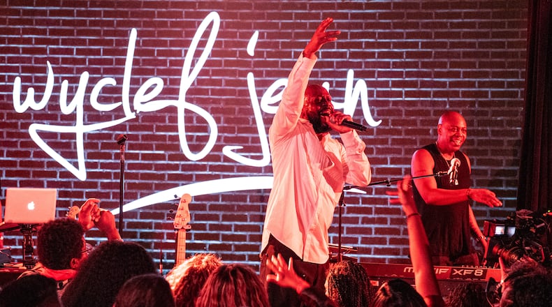 Wyclef Jean (center) and Dave Chappelle perform at the Haitian Appreciation Show at the at the YS Firehouse on April 5. Mathieu Bitton/CONTRIBUTED PHOTO