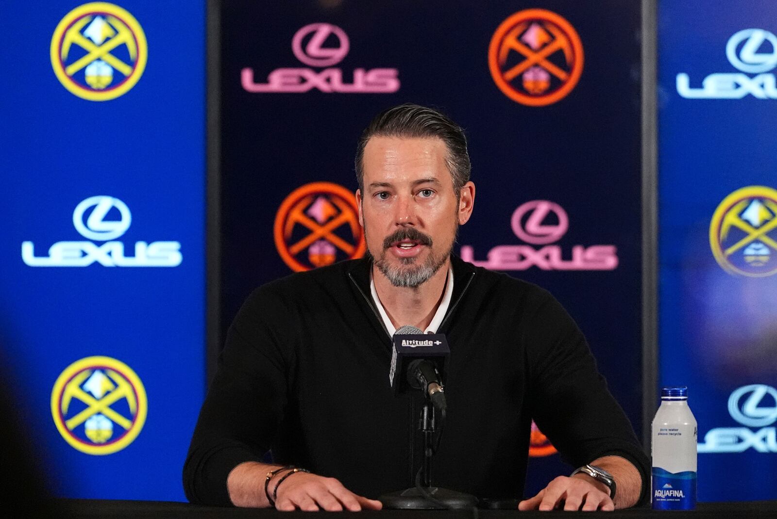 Denver Nuggets team president Josh Kroenke responds to questions at a news conference Monday, April 14, 2025, in Denver about the firing of the team's general manager and head coach last week. (AP Photo/David Zalubowski)