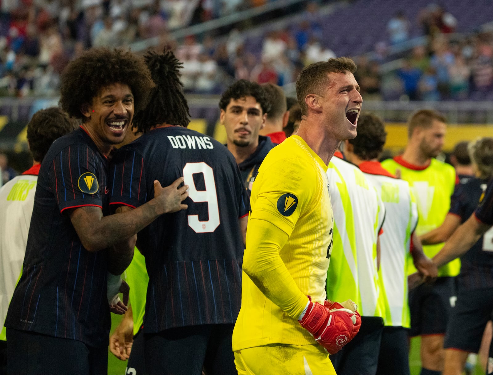 United States goalkeeper Matthew Freese, front right, reacts toward the crowd after he saved enough Costa Rica penalty kicks for his team to prevail in a CONCACAF Gold Cup quarterfinals soccer match Sunday, June 29, 2025, in Minneapolis. (Jeff Wheeler/Star Tribune via AP)