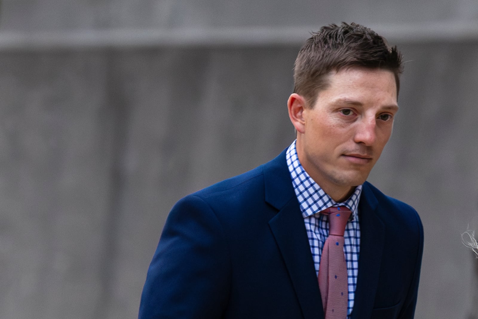 Former Grand Rapids Police officer Christopher Schurr enters the Kent County Courthouse in Grand Rapids, Mich. on Friday, May 2, 2025. (Joel Bissell /Kalamazoo Gazette via AP)