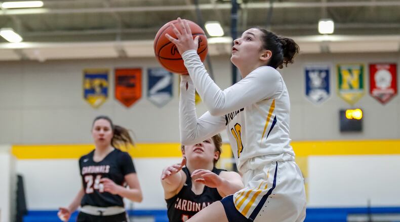 Springfield High School senior Mickayla Perdue drives to the hoop during the Wildcats game against Triad on Monday, Jan. 27. Perdue leads the GWOC in scoring at 22.1 points per game. CONTRIBUTED PHOTO BY MICHAEL COOPER