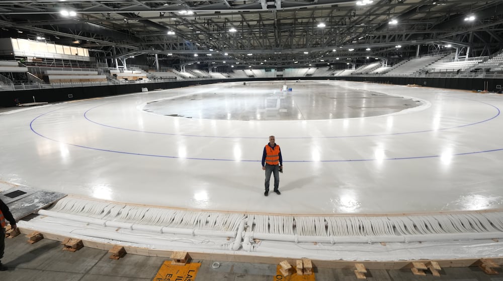 Ice Master Mark Messer poses in the stadium where speed skating discipline of the Milan Cortina 2026 Winter Olympics will take place, in Rho, outskirt of Milan, Tuesday, Nov. 11, 2025. (AP Photo/Luca Bruno)