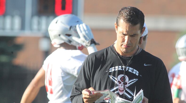 Ohio State defensive coordinator Luke Fickell prepares for drills during the first practice for Ohio State freshmen on Sunday, Aug. 7, 2016, at the Woody Hayes Athletic Center in Columbus. David Jablonski/Staff