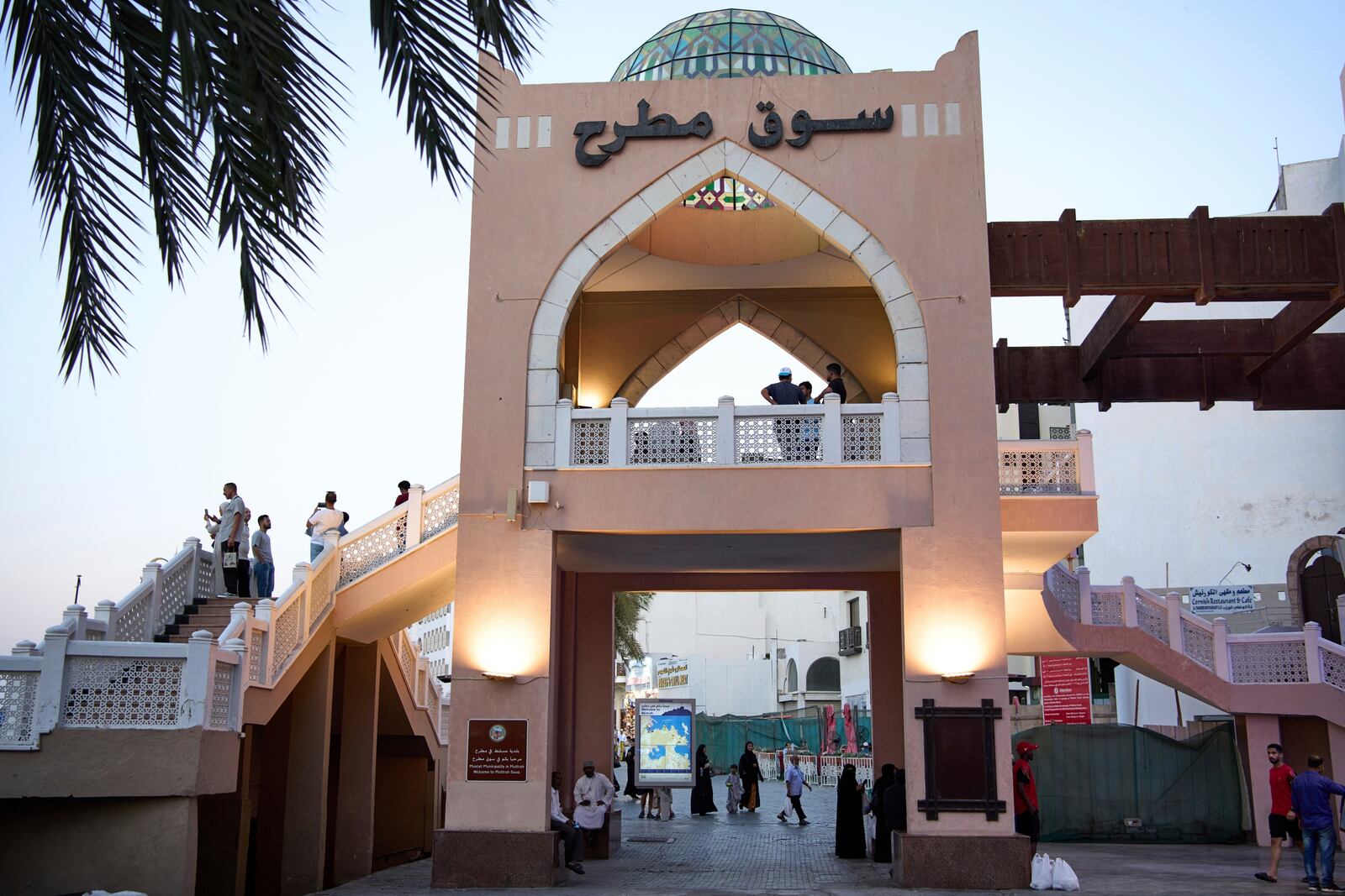 People walk through Mutrah Souq in Muscat, Oman, Friday, April 11, 2025. (AP Photo/ Fatima Shbair)