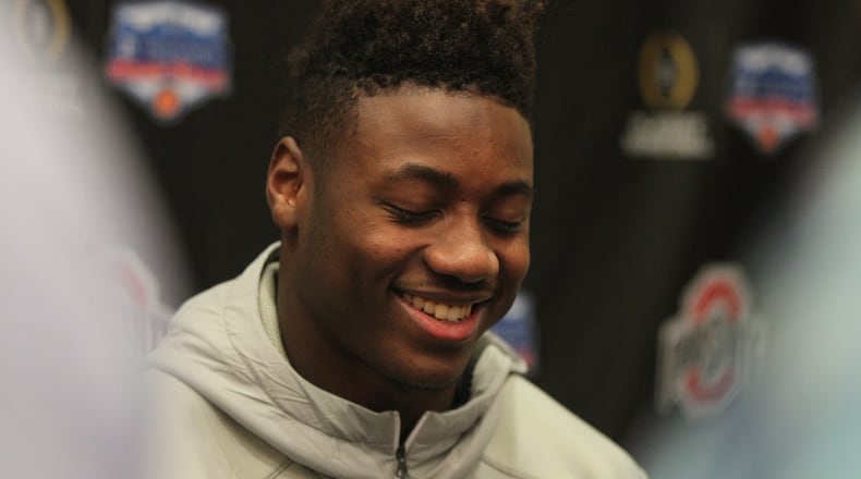 Curtis Samuel laughs as he answers a question Tuesday. David Jablonski/Staff